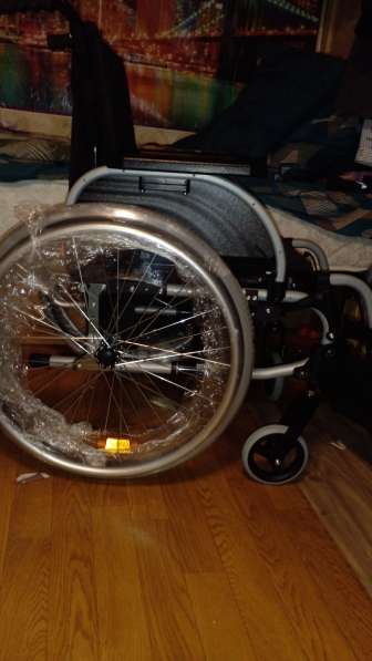 Новая инвалидная коляска