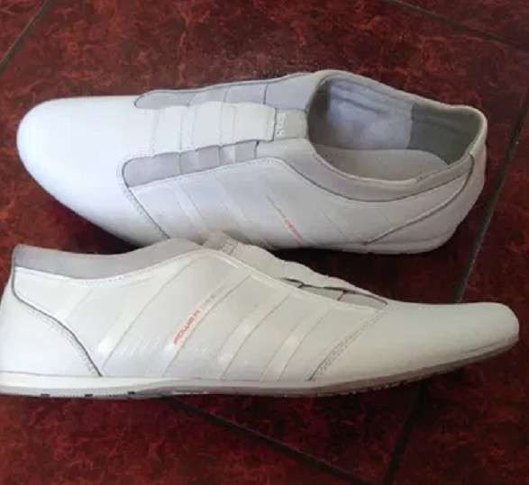 Продам новые белые мужские спортивные туфли 42 размера в фото 3