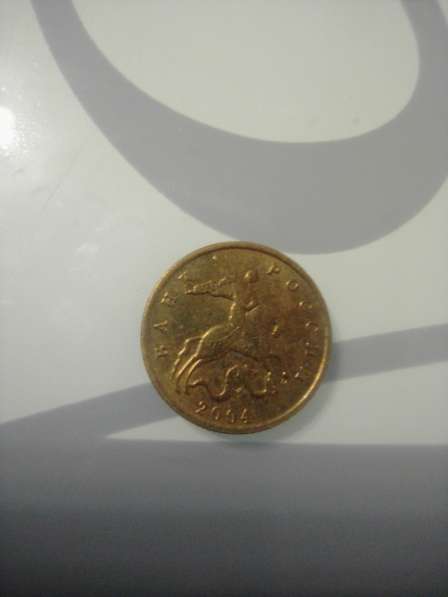 Монета 10 копеек 2004 года в Череповце